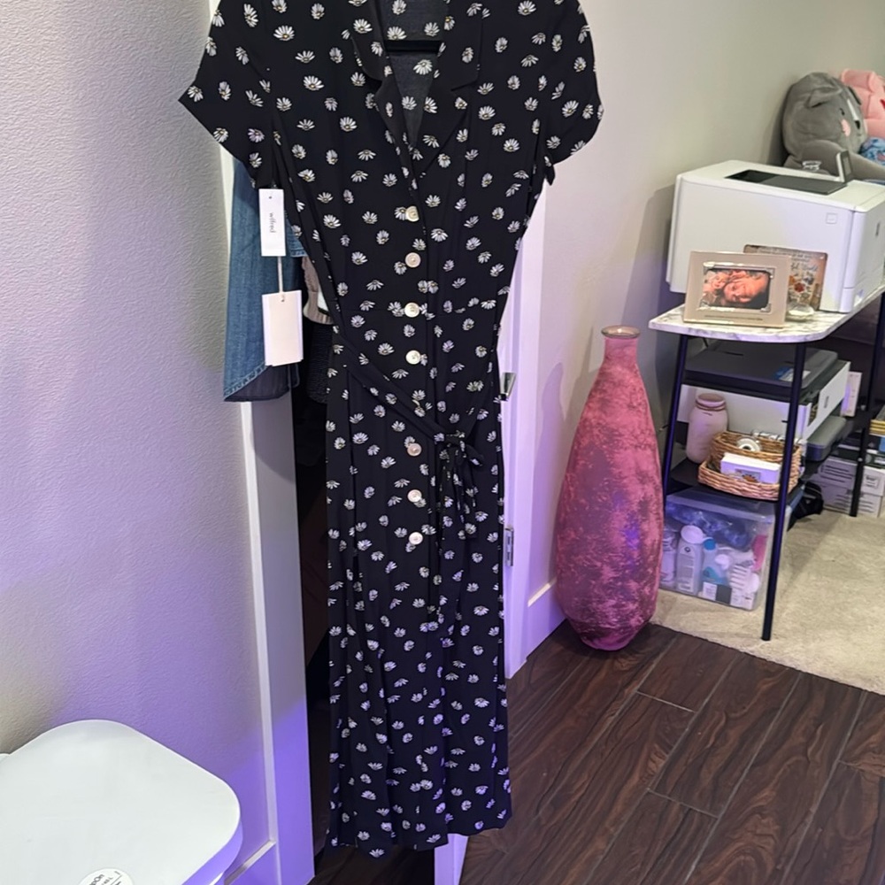 Brand new with tags belted sunflower dress.  This is a beautiful long dress!